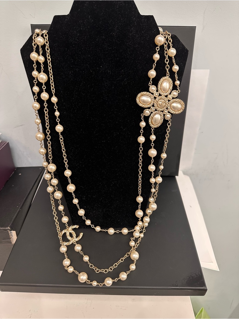 CHANEL Gold-Tone Multi-Strand Pearl Necklace with Floral Medallion